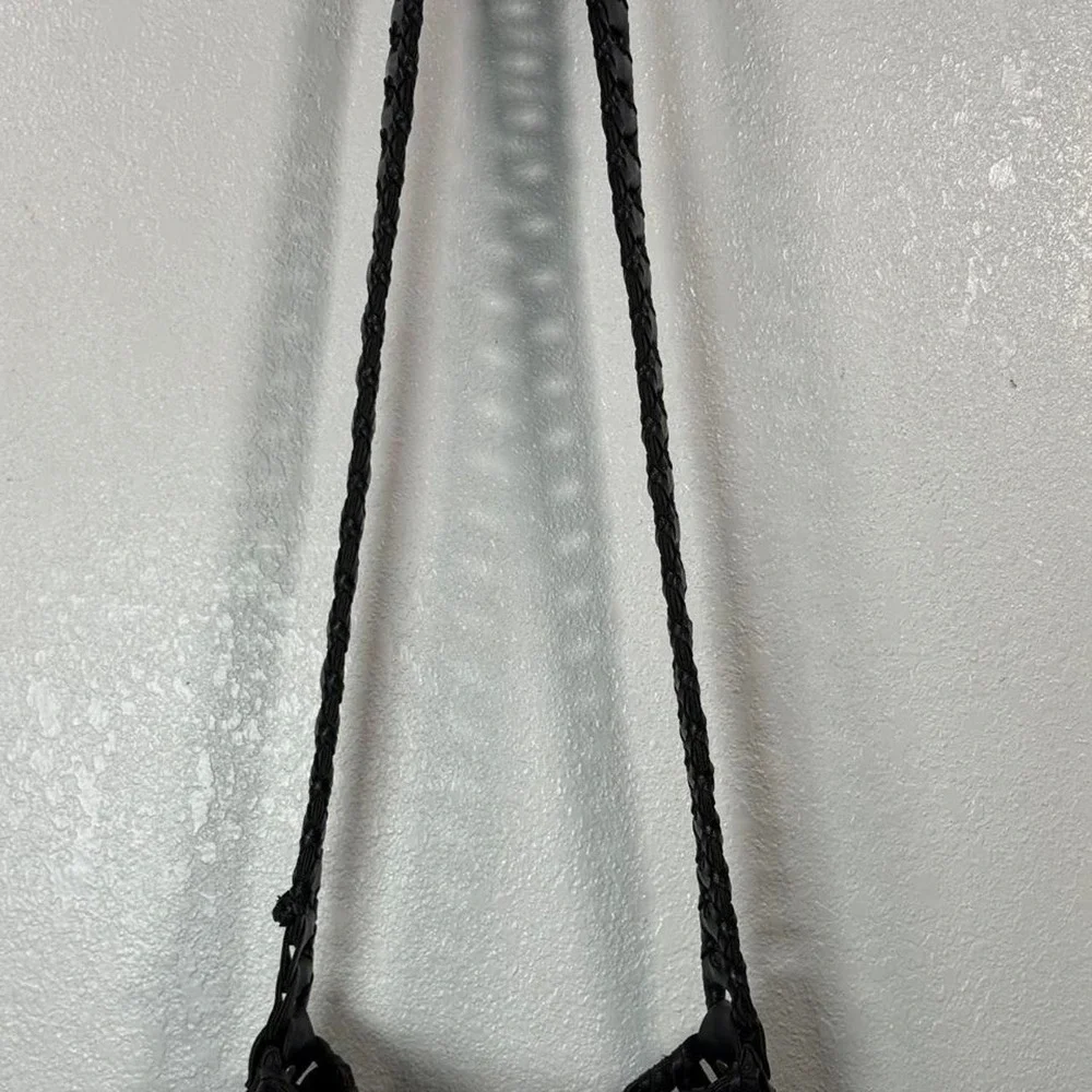 Black woven leather shoulder bag with strap